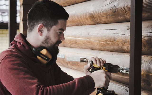 Contractor using drill